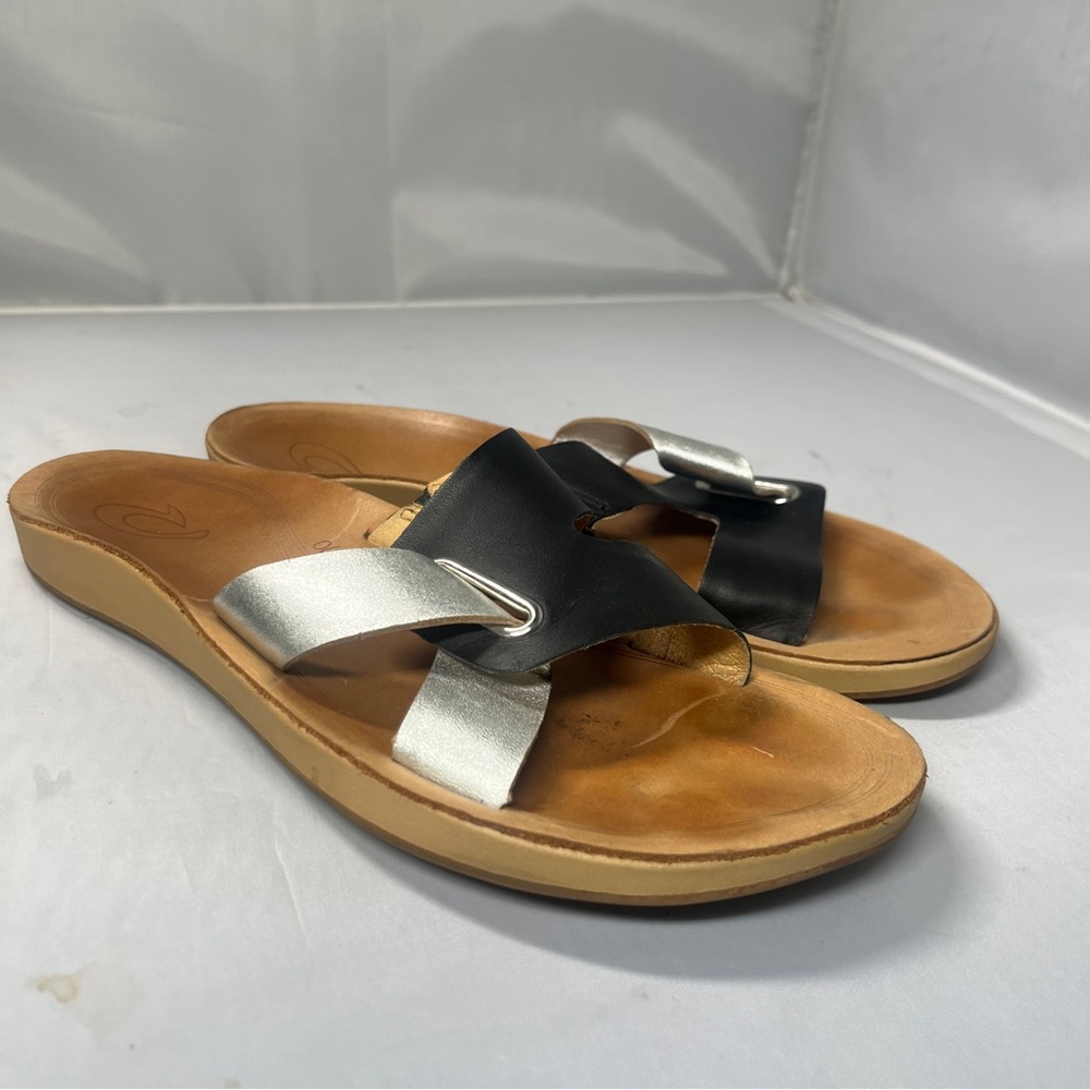 OluKai Black and Silver Women's Sandals 6